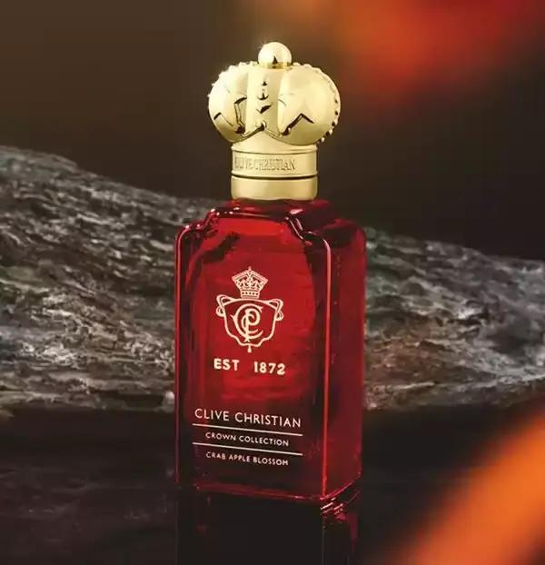 Parfum unisexe Royal Crown Top, flacon rouge rubis brillant, arôme floral boisé sucré, parfum longue durée pour banquets, usage quotidien, bureau, tenues formelles.