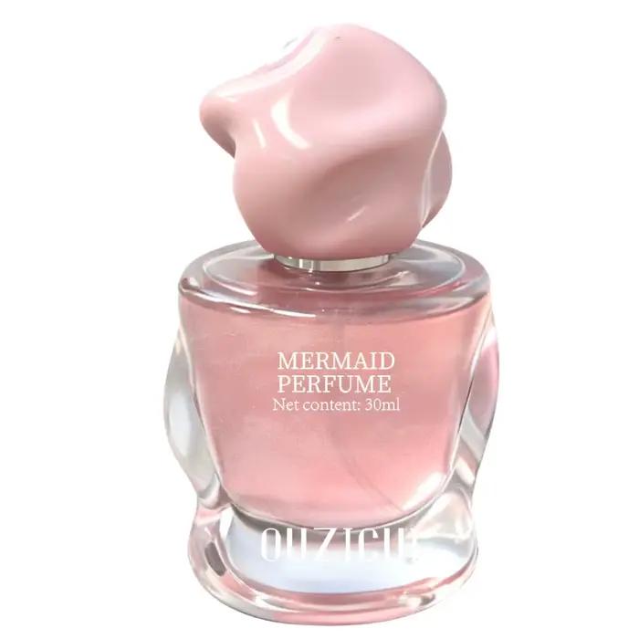 Spray de parfum floral fruité boisé