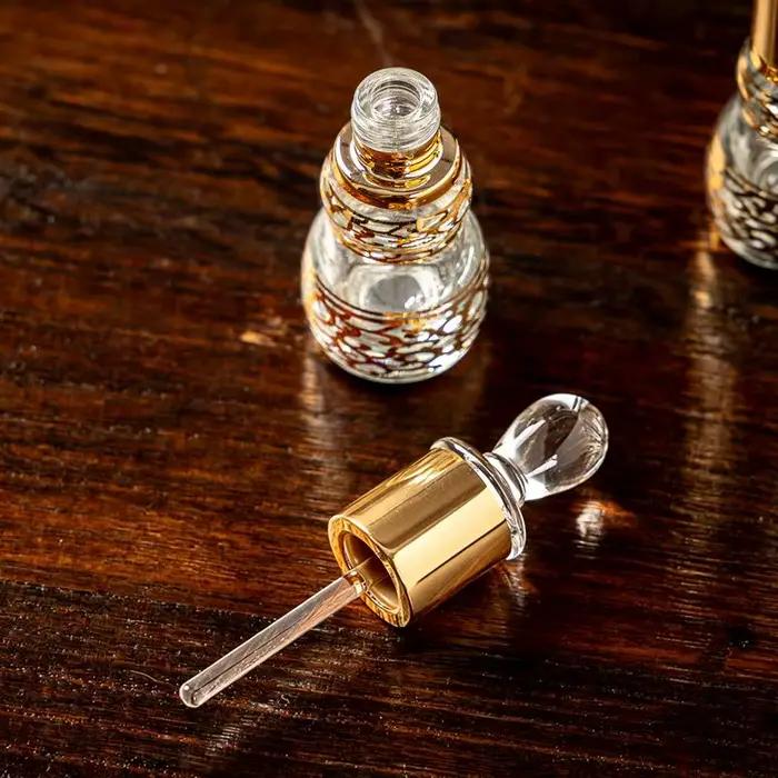 Flacon à bille doré en forme de gourde de 12 ml, flacon rechargeable pour huile de parfum, idéal pour l'aromathérapie et les projets de bricolage.