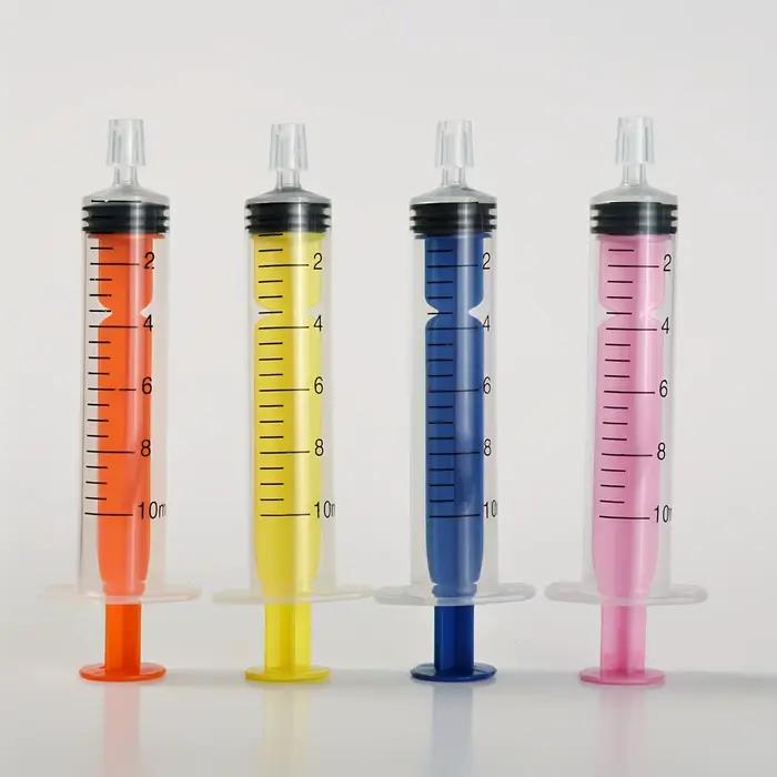 Seringue à pointe de parfum colorée