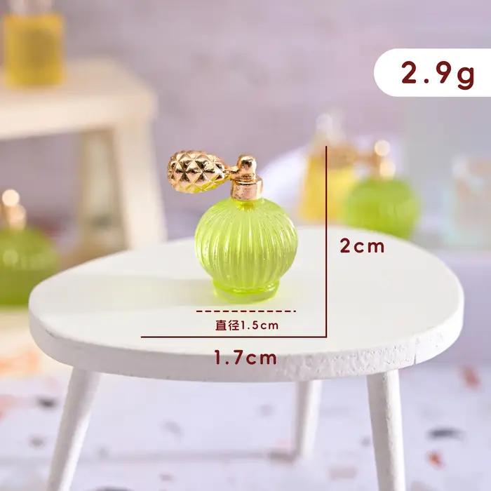 Mini bouteille de parfum en résine colorée