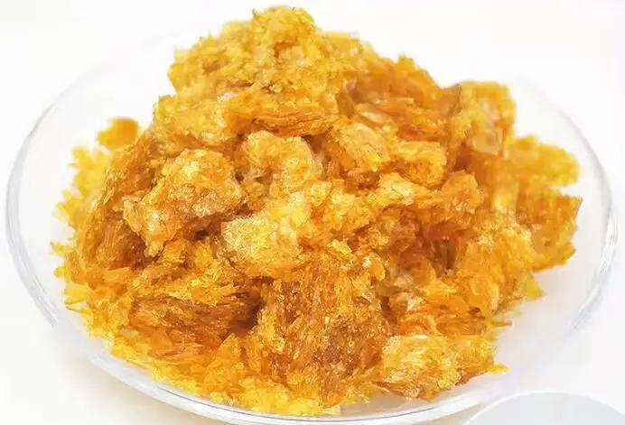 Laque de gomme laque dorée transparente